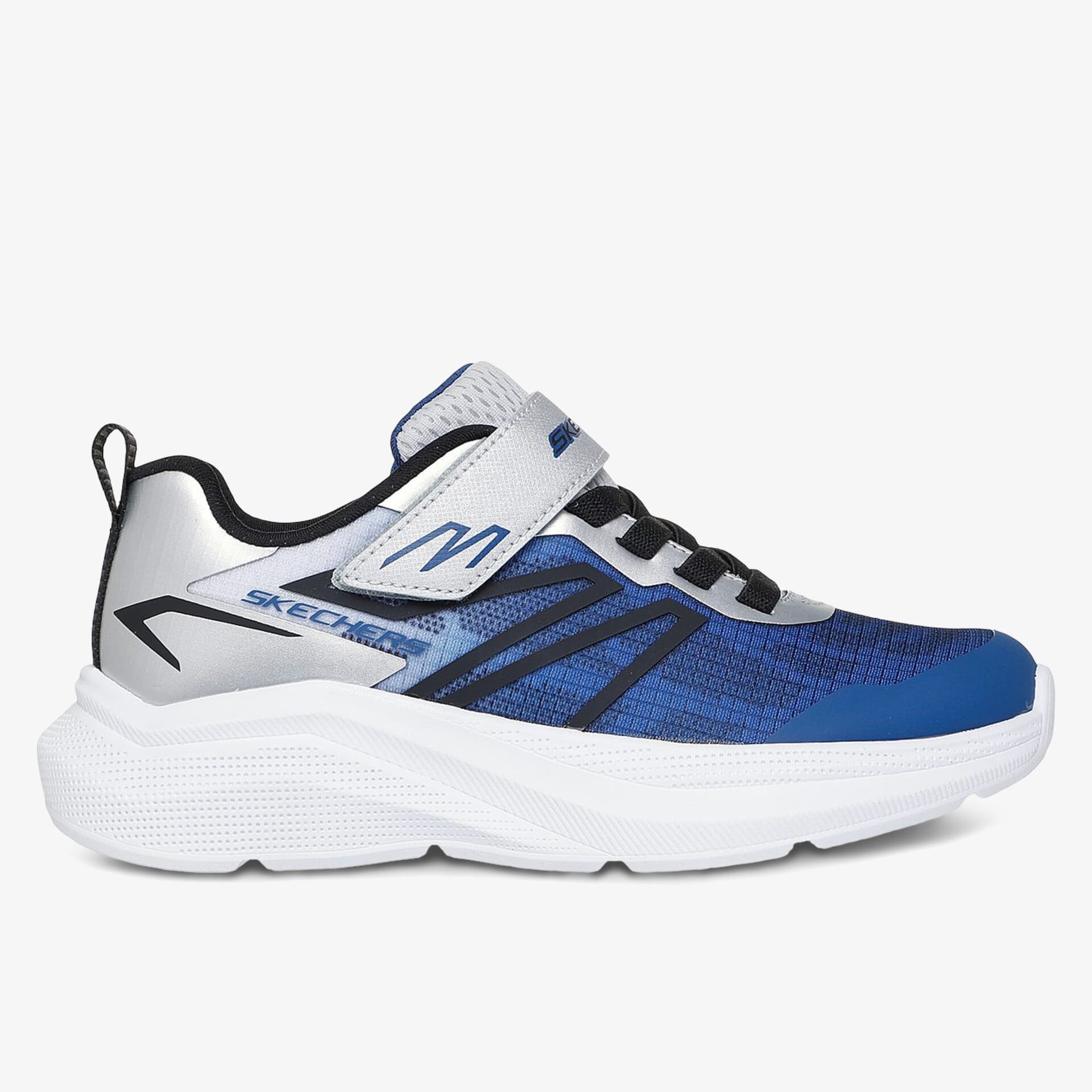 Blauer, sportlicher Sneaker mit Klettverschluss, seitlicher Ansicht, weißer Sohle